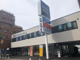 本社外観（２０２１年４月に福岡市南区へ移転）