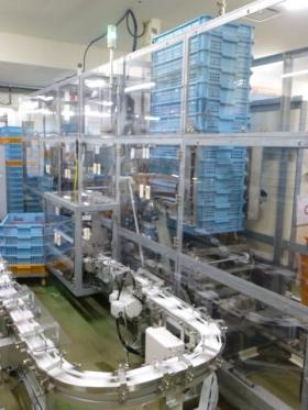 出荷 コンテナ入れ及び自動コンテナ積