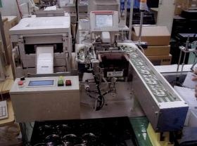 レンズ自動包装機