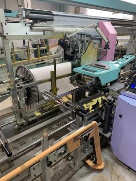 自動差入機（繊維機械）