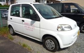 自動車または電動自転車で移動します