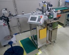 切断圧着課の機械